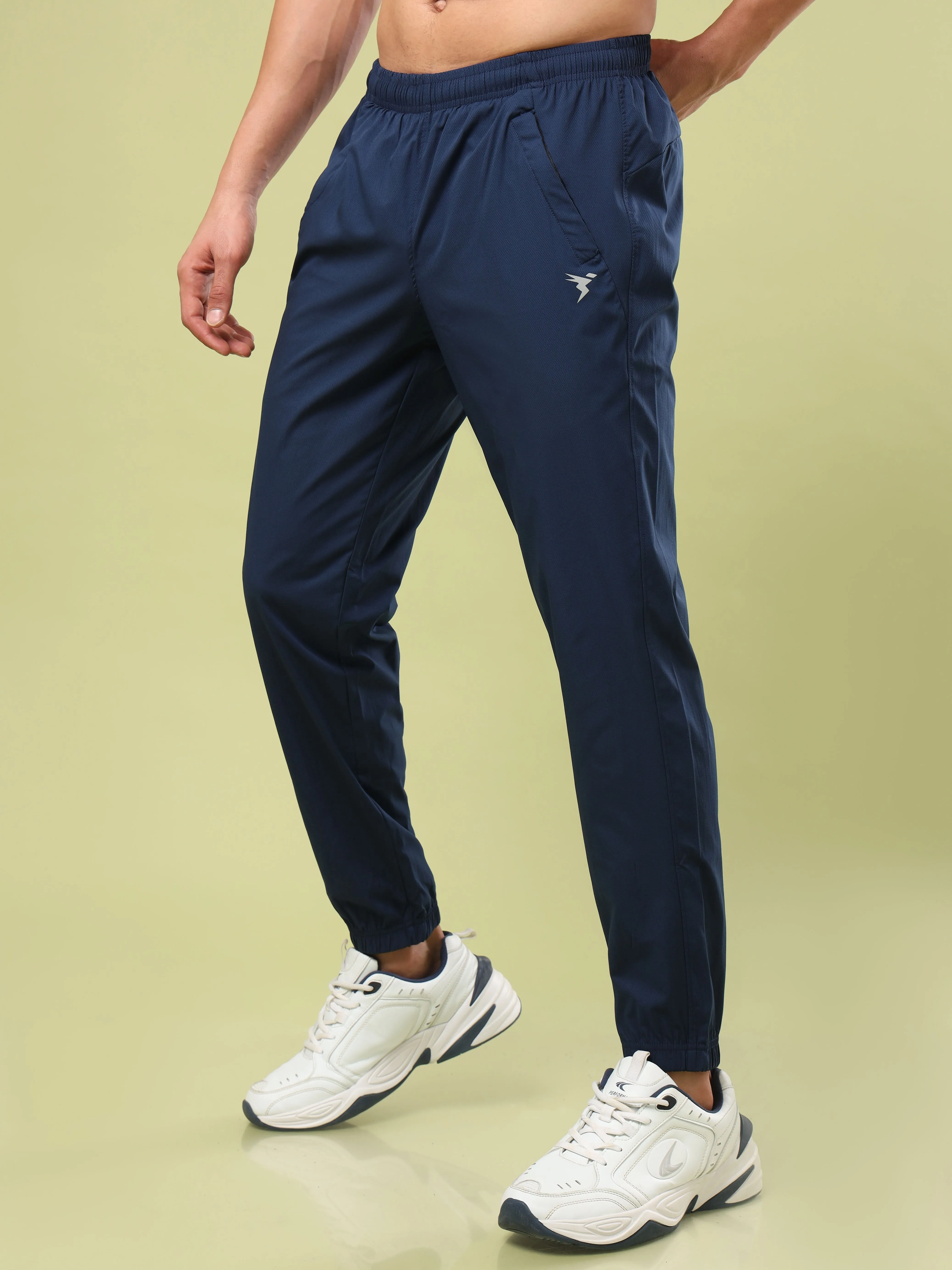 Men Solid Relax Fit Joggers with TECHNOLITE
