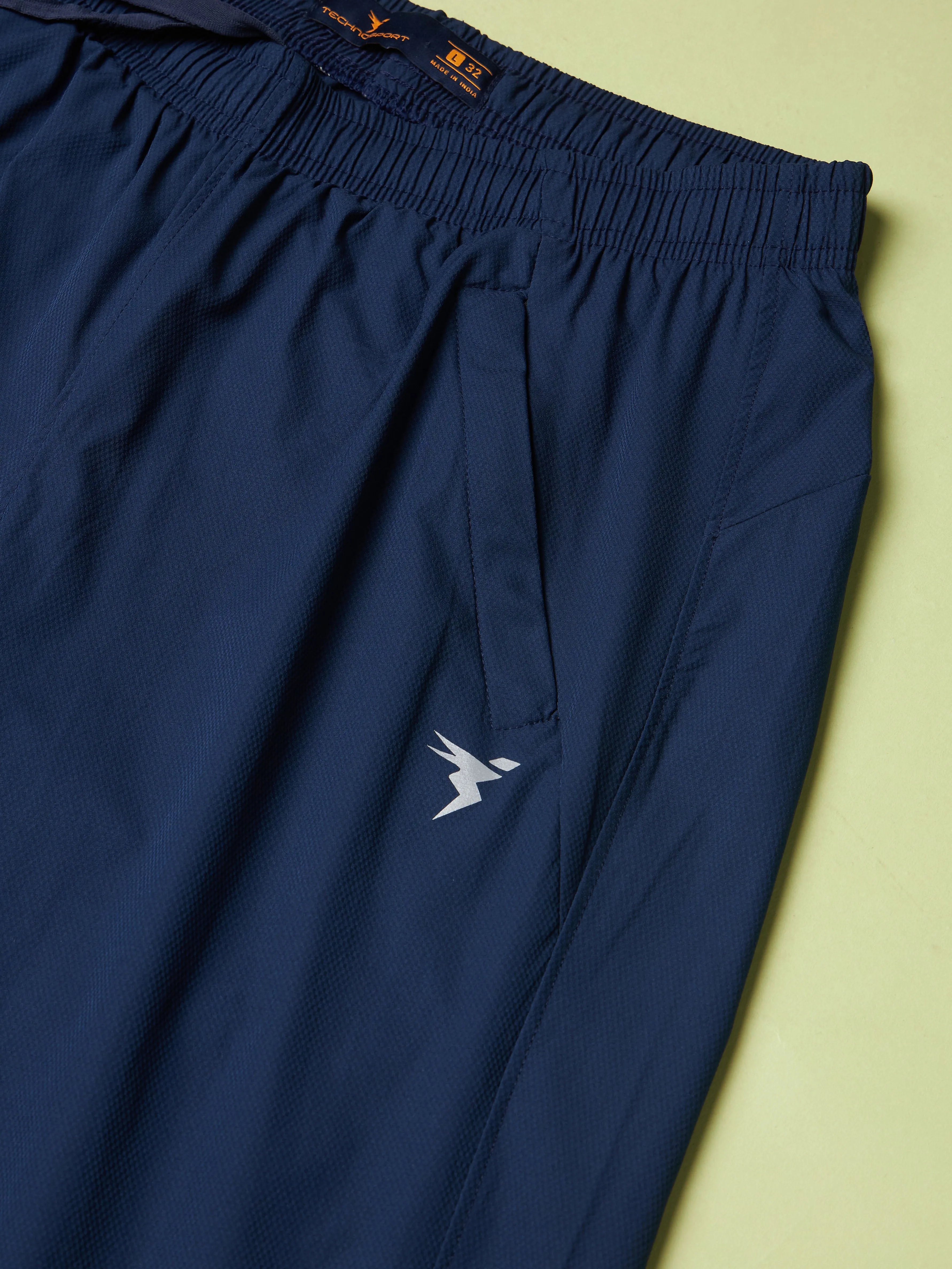 Men Solid Relax Fit Joggers with TECHNOLITE