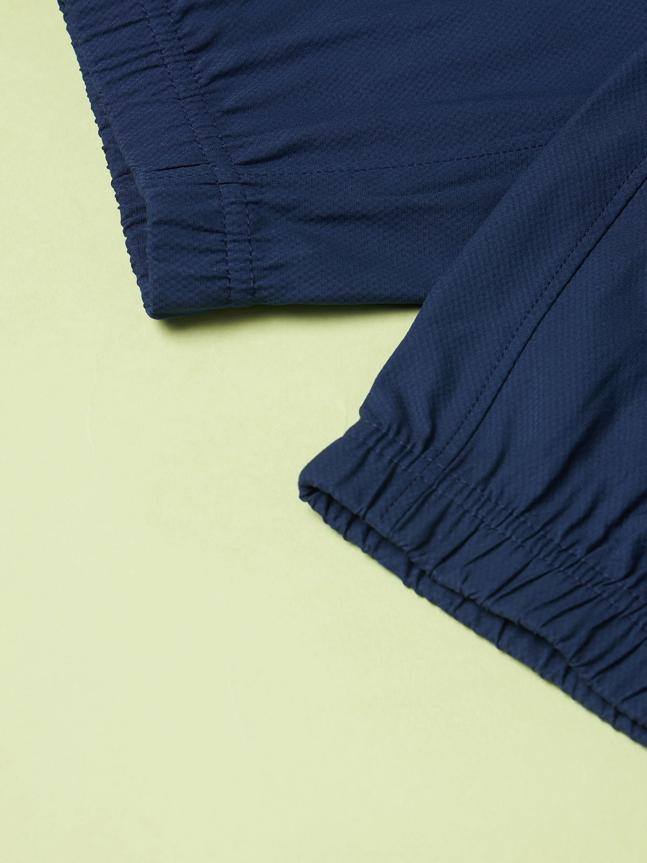 Men Solid Relax Fit Joggers with TECHNOLITE