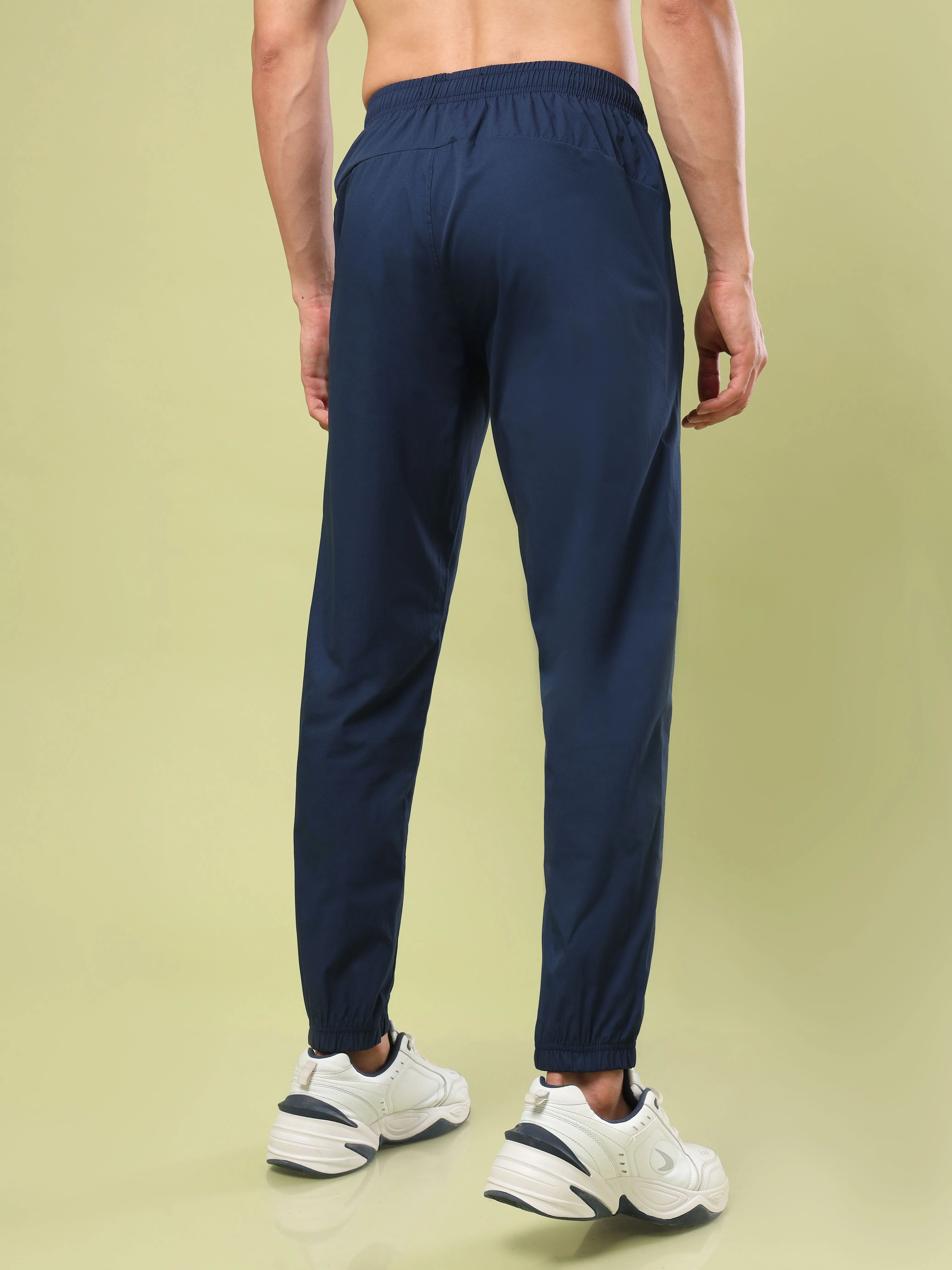 Men Solid Relax Fit Joggers with TECHNOLITE