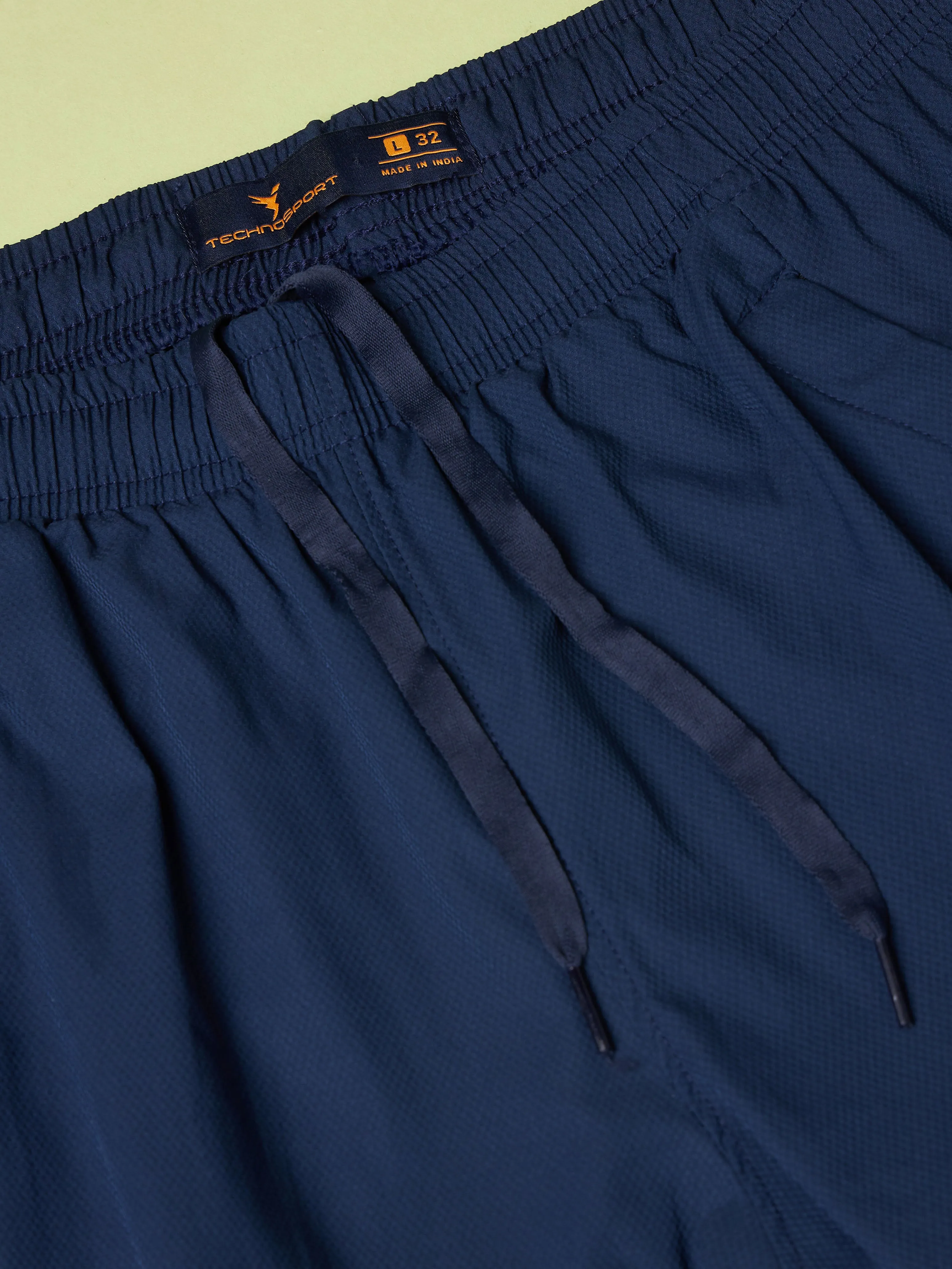 Men Solid Relax Fit Joggers with TECHNOLITE